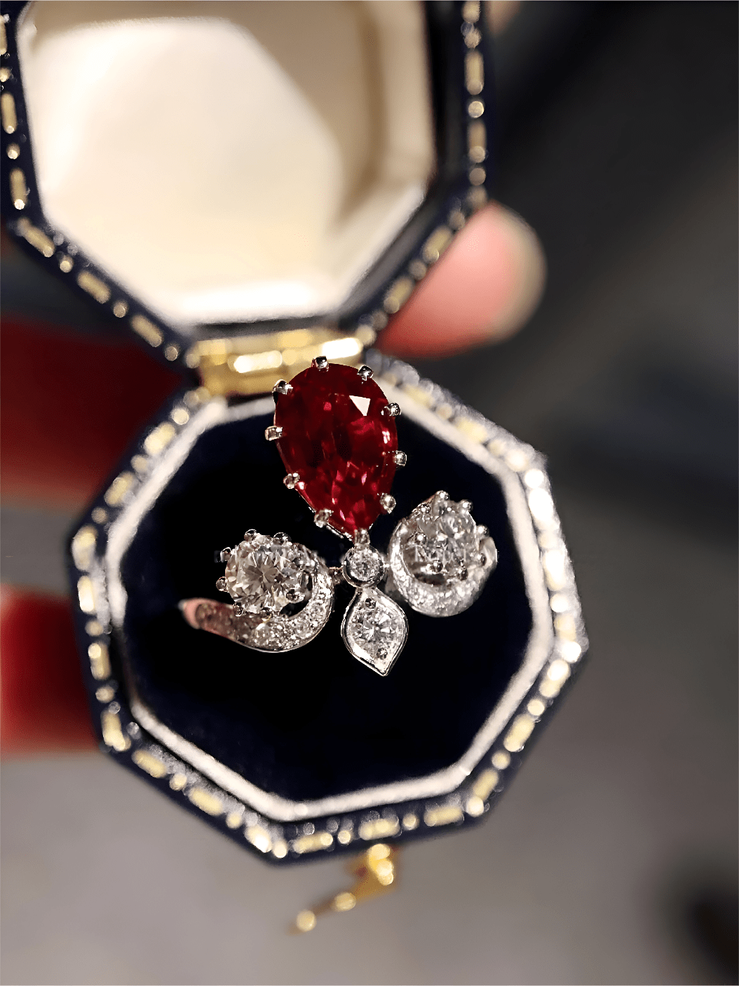 Calistara ring with 2ct pear lab-grown ruby and diamond accents in white gold crown-style setting