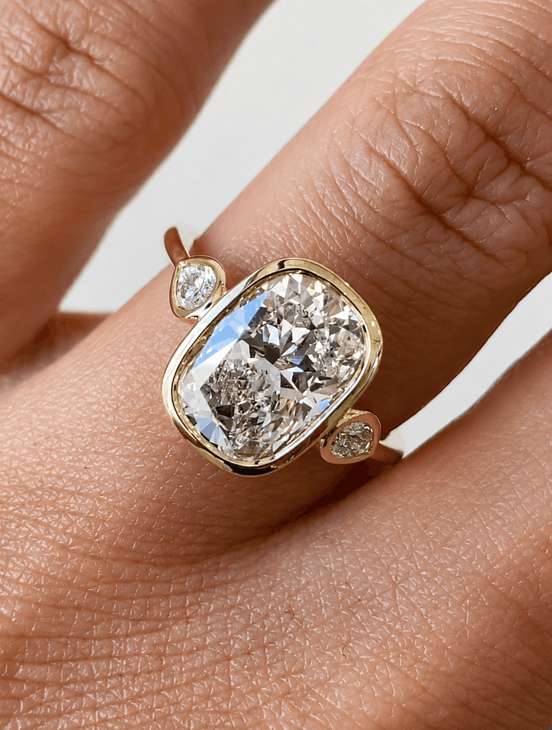 Ariavelle three stone bezel set diamond ring in yellow gold by La Forêt