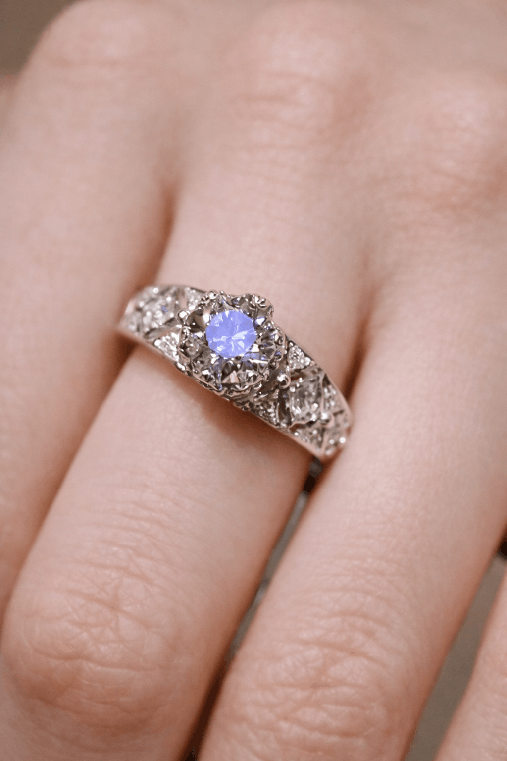 Kalindra ring with 1.5ct lab-grown diamond, floral halo, and vintage-inspired band in white gold – elegant sustainable engagement ring
