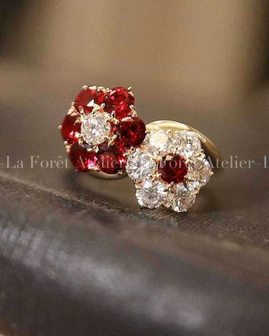 Open floral ring with lab-grown rubies and diamonds in solid gold setting
