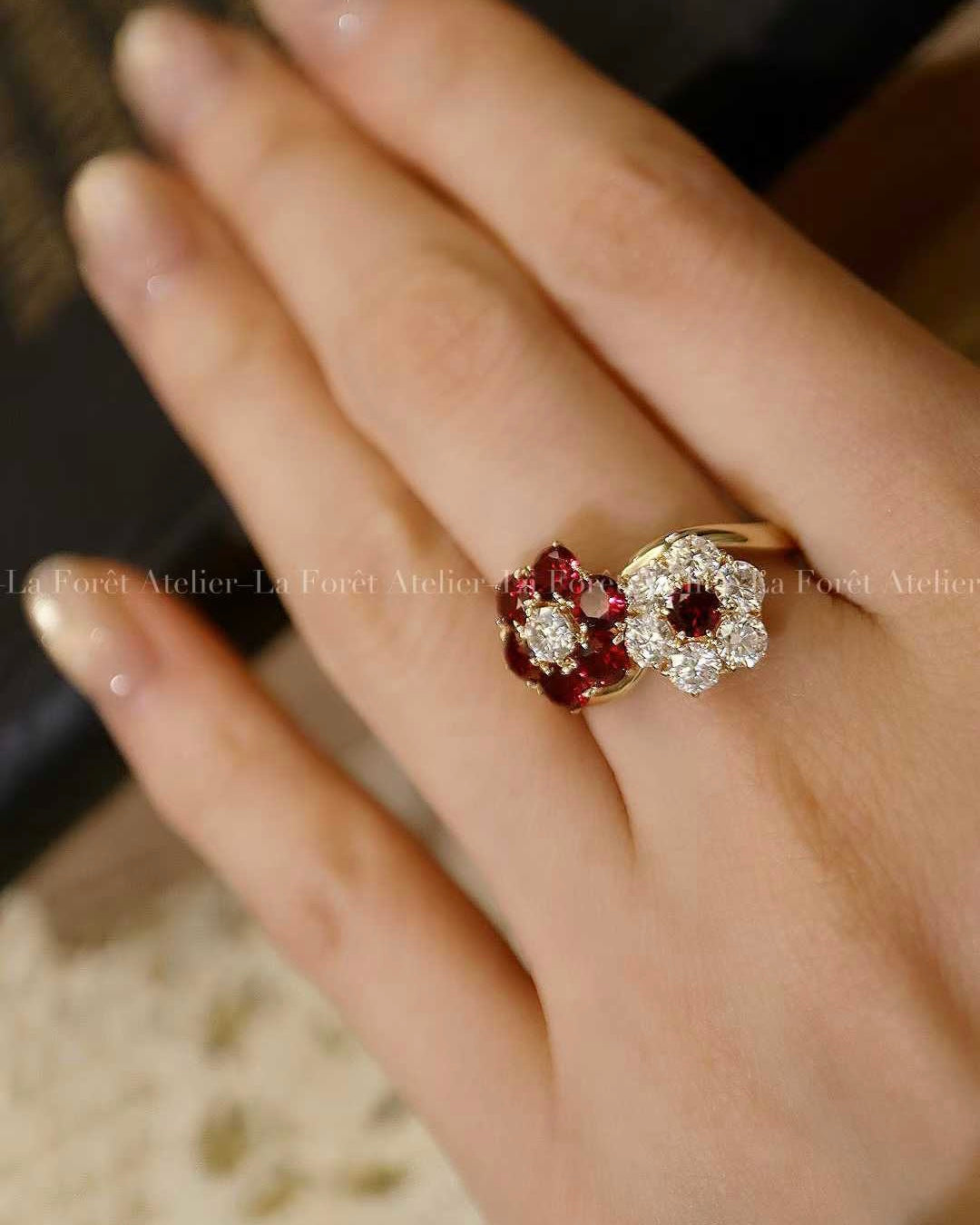 Open floral ring with lab-grown rubies and diamonds in solid gold setting
