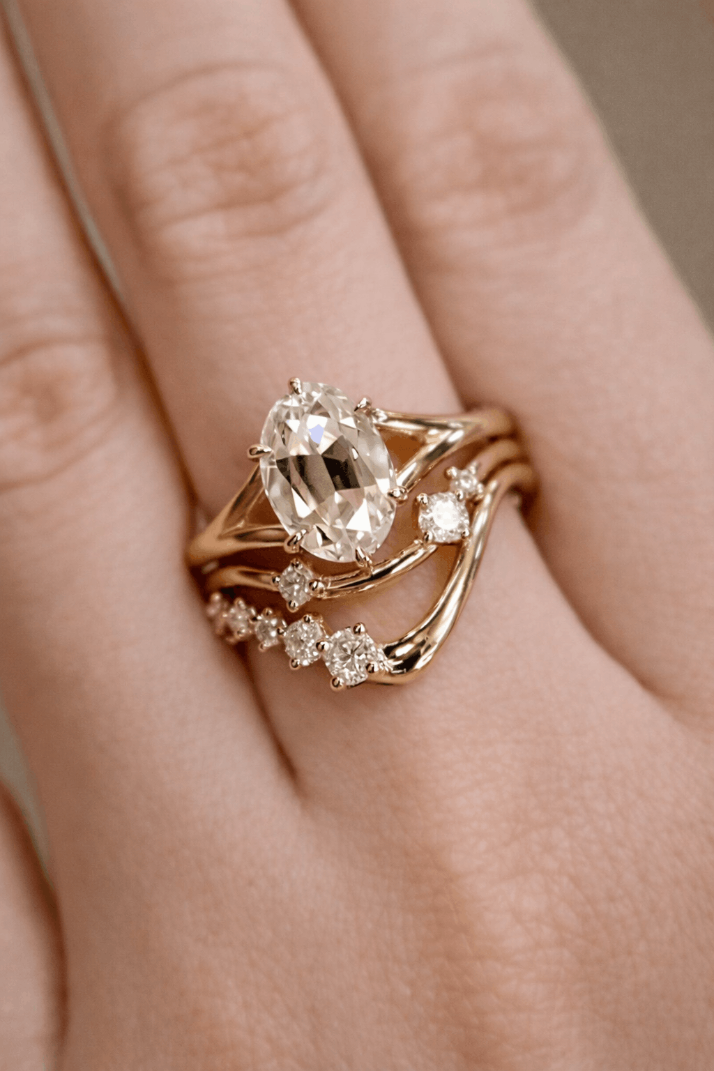 Alura ring set with 2ct lab-grown oval diamond and curved gold bands with diamond accents – organic and elegant bridal jewelry
