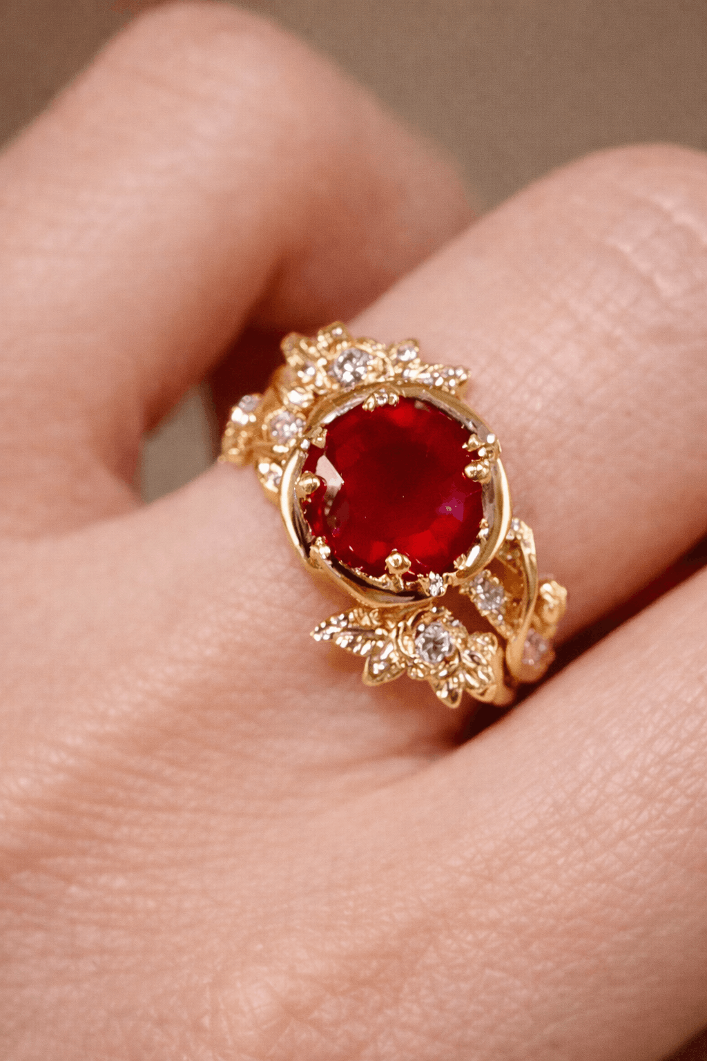 Valtira ring with 1.5ct lab-grown ruby and floral diamond-accented gold setting