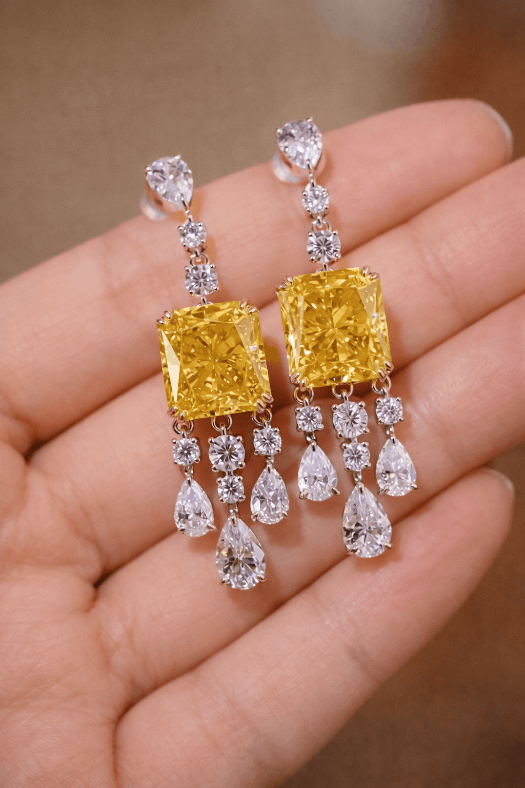 Elegant drop earrings with radiant 4ct lab-grown yellow diamonds and white diamond accents
