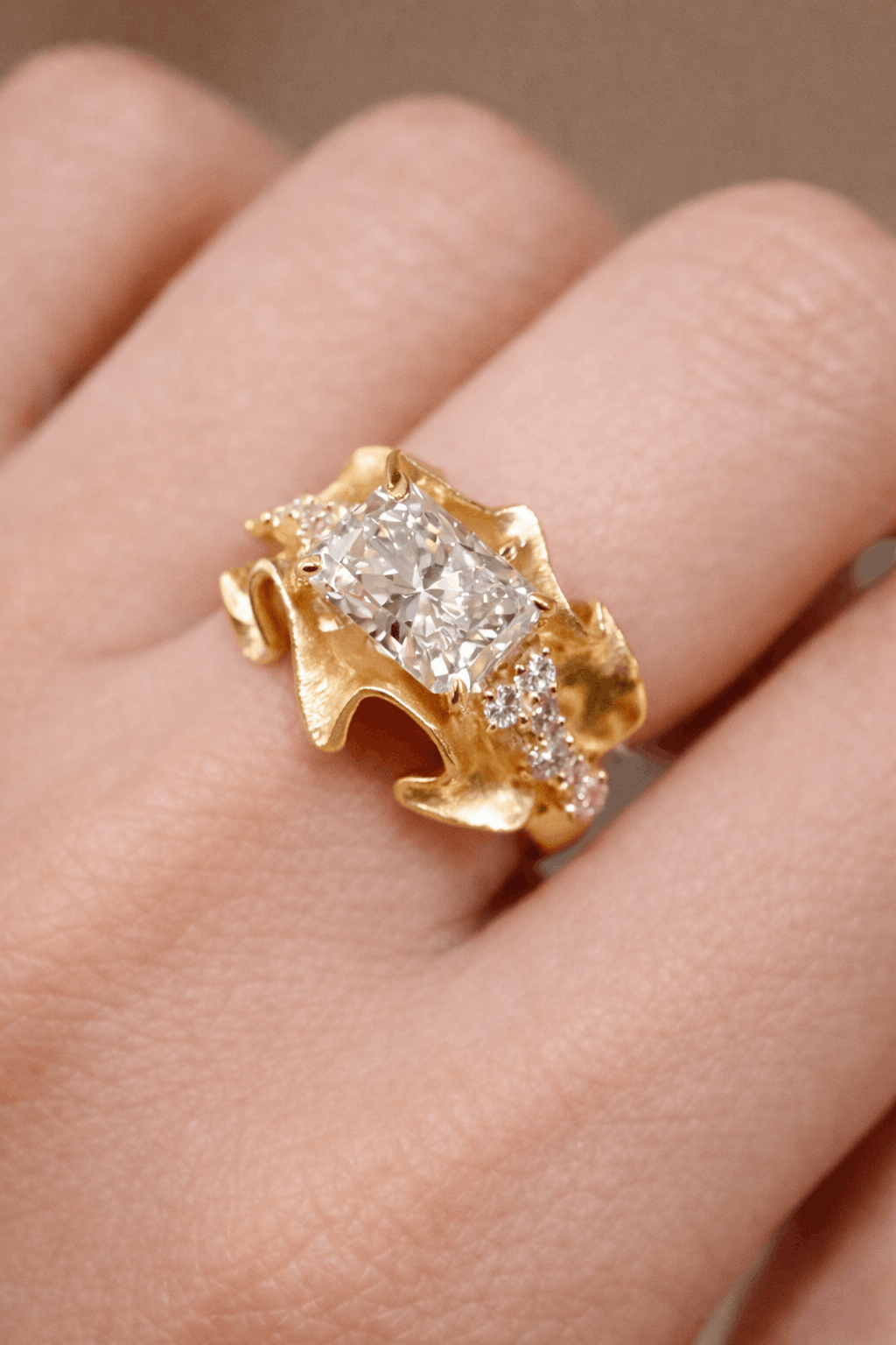 Floren ring featuring a 2ct lab-grown diamond in a sculpted gold floral design
