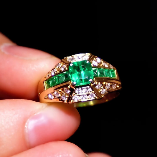 Geometric gold ring with 4x5mm lab emerald and diamonds

