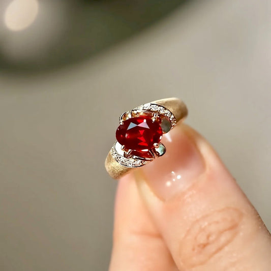 Gold ring with 2ct lab ruby and pavé diamonds

