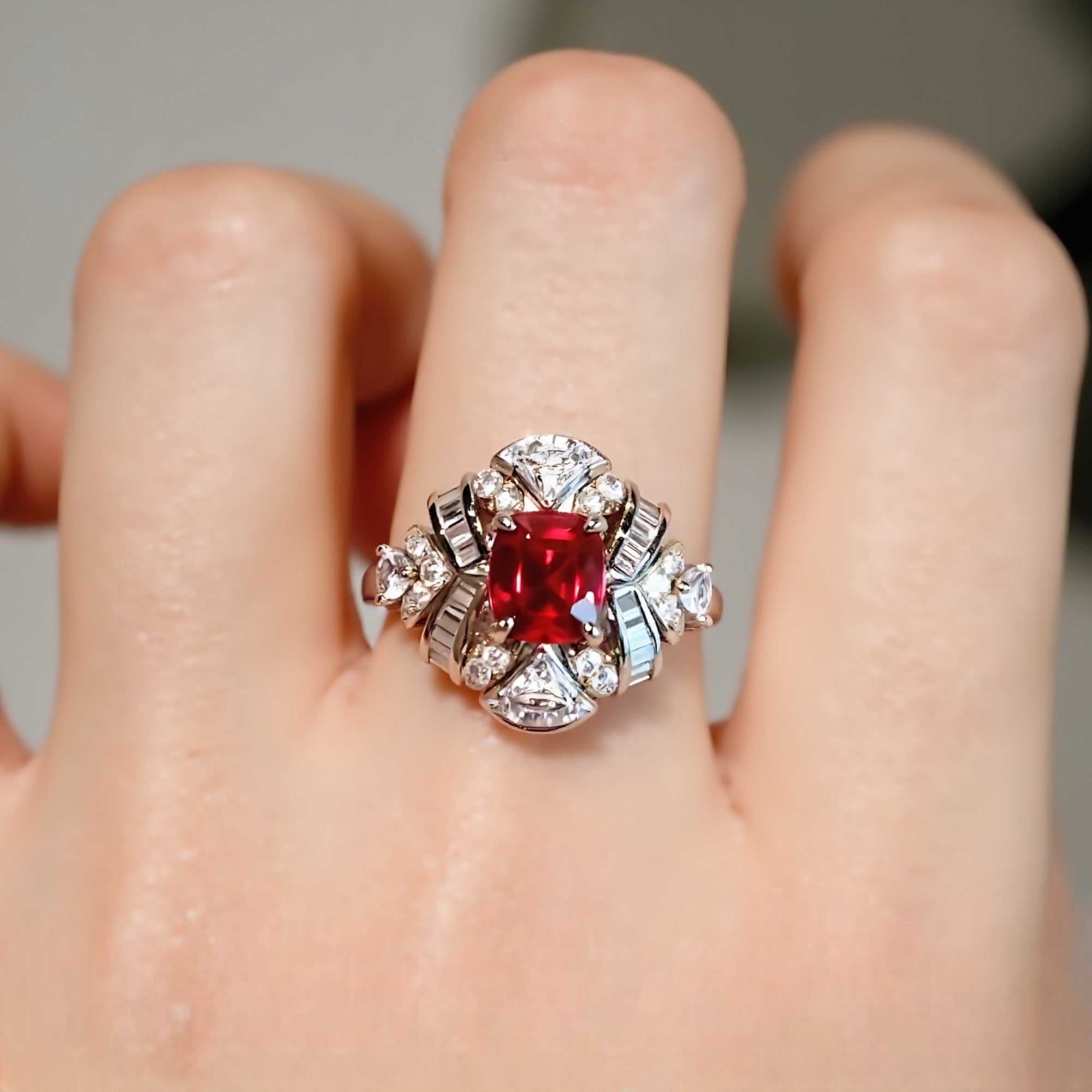 1ct lab ruby cocktail ring with bold diamond cross design

