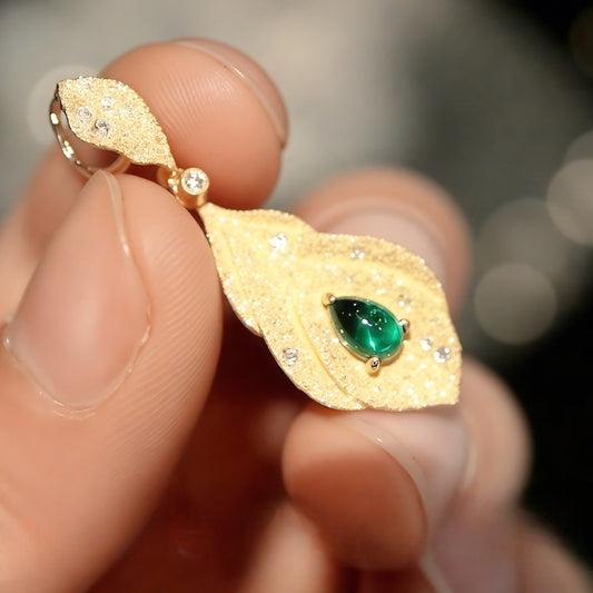 Sorrel gold leaf pendant with lab emerald and diamond accents

