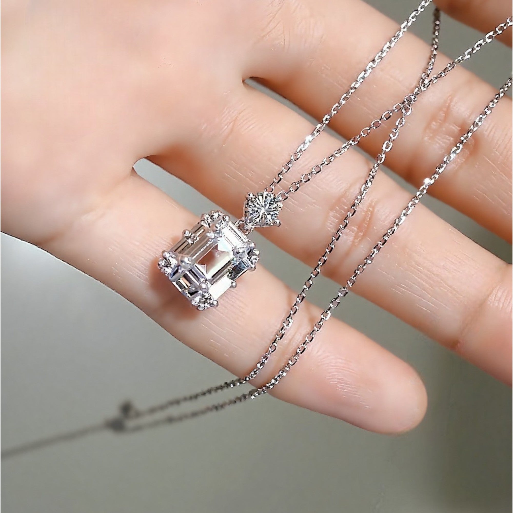 Lyra pendant with emerald-cut lab diamond on silver chain

