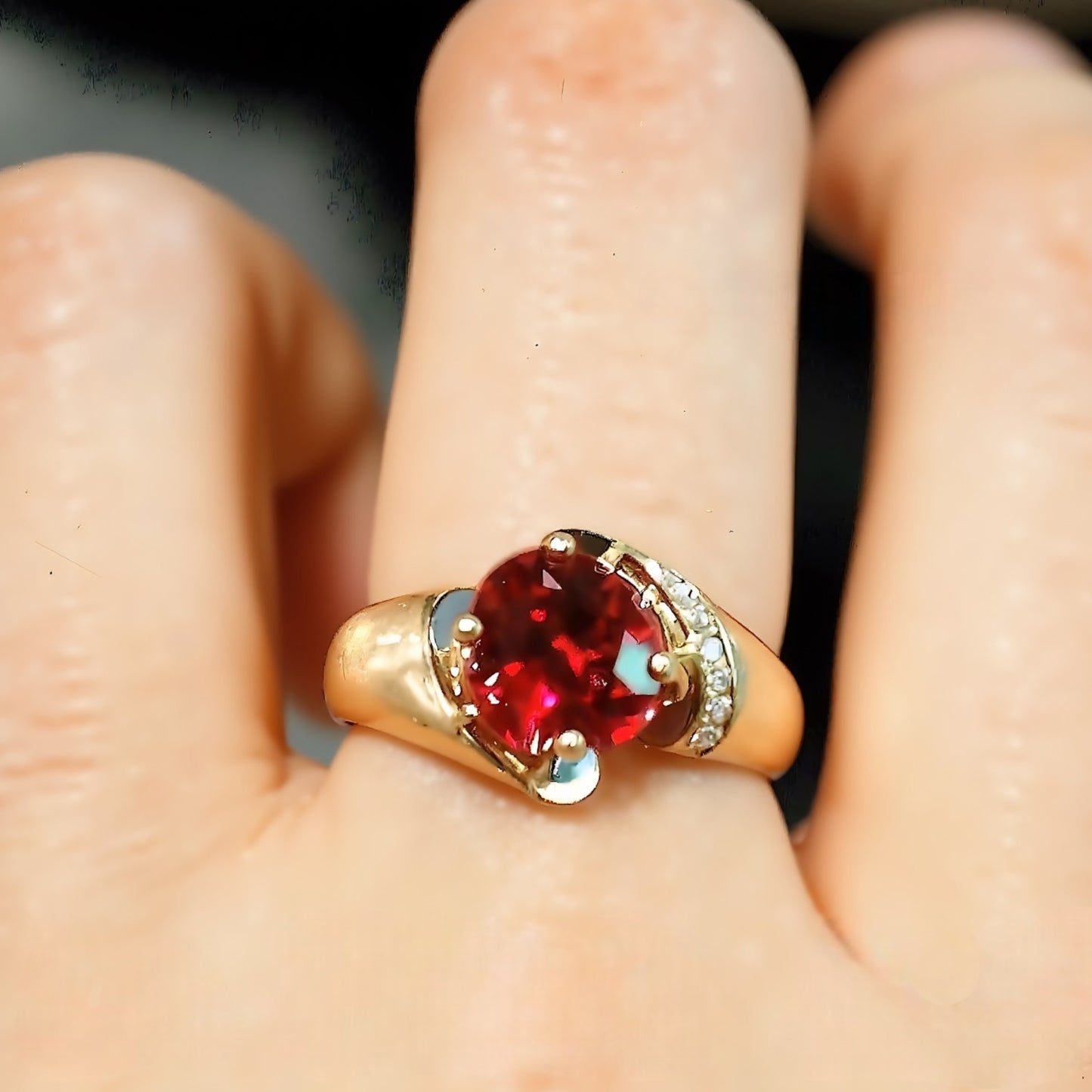 Gold ring with 2ct lab ruby and pavé diamonds

