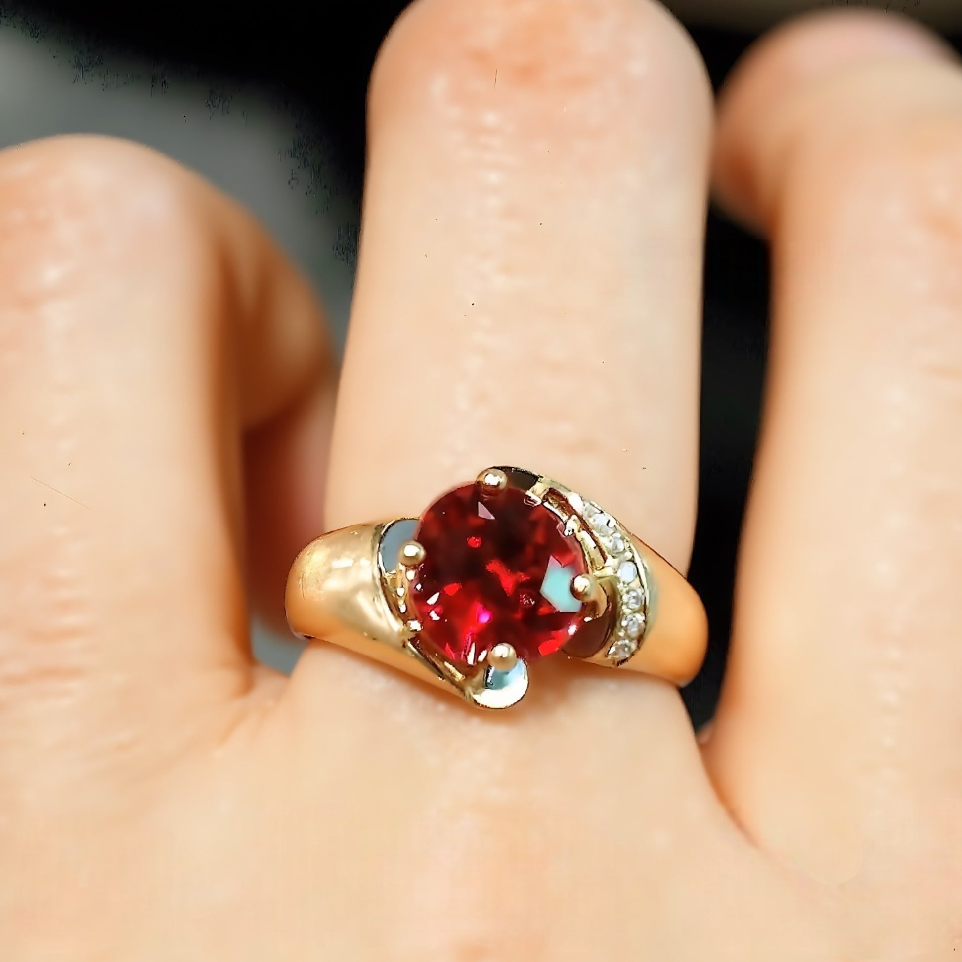 Gold ring with 2ct lab ruby and pavé diamonds


