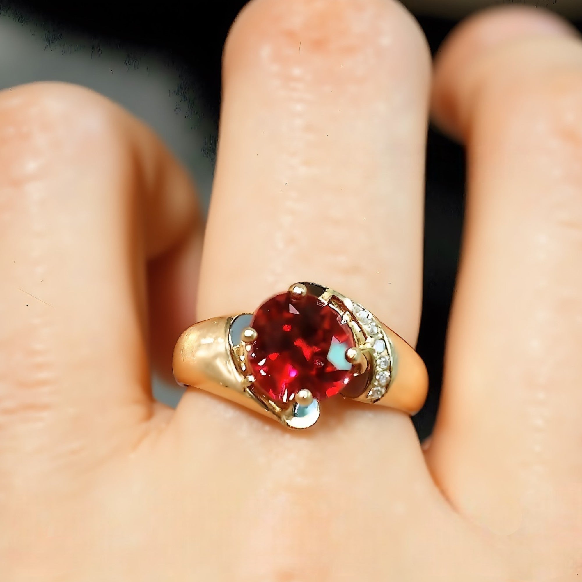 Gold ring with 2ct lab ruby and pavé diamonds

