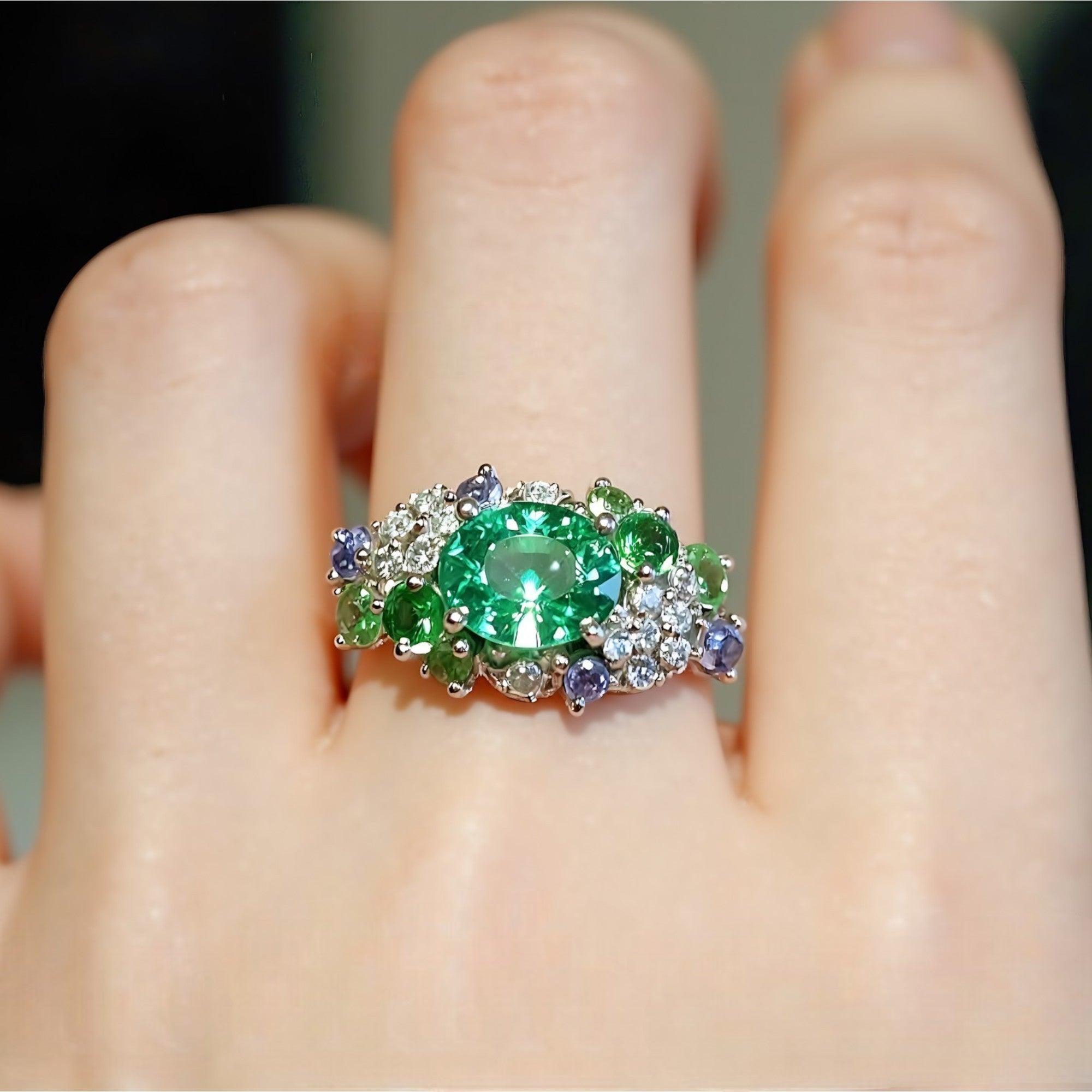 Verda Bloom ring with lab tsavorite, diamonds, and tanzanites

