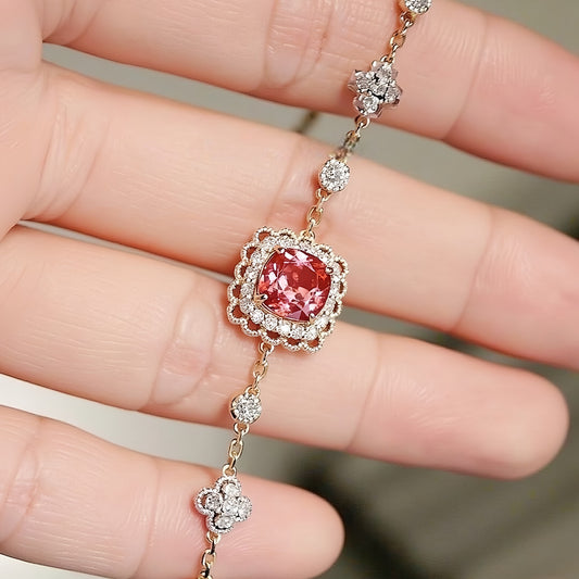 Seraphine bracelet with lab padparadscha sapphire and floral diamond links

