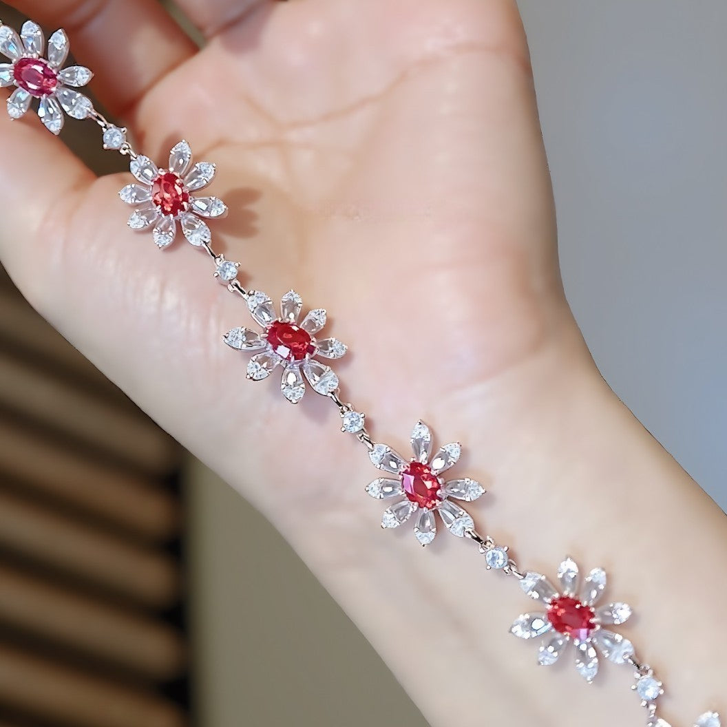 Lab padparadscha sapphire floral bracelet with marquise petal setting in silver finish








