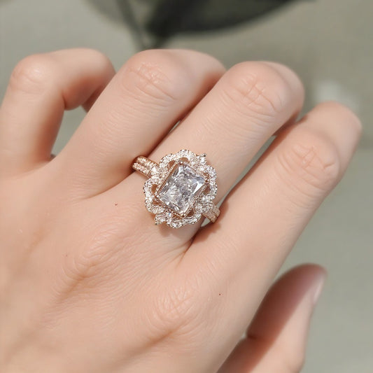 Radiant cut lab diamond halo ring in rose gold with marquise and round diamond petals


1/2








