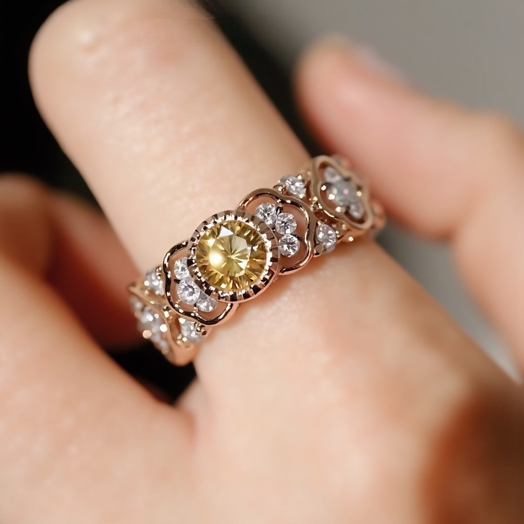 Vintage floral ring with 0.6ct lab yellow diamond and white diamond accents








