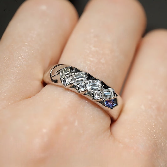 Delano ring with baguette lab diamonds and hidden sapphire accent in sleek channel setting








