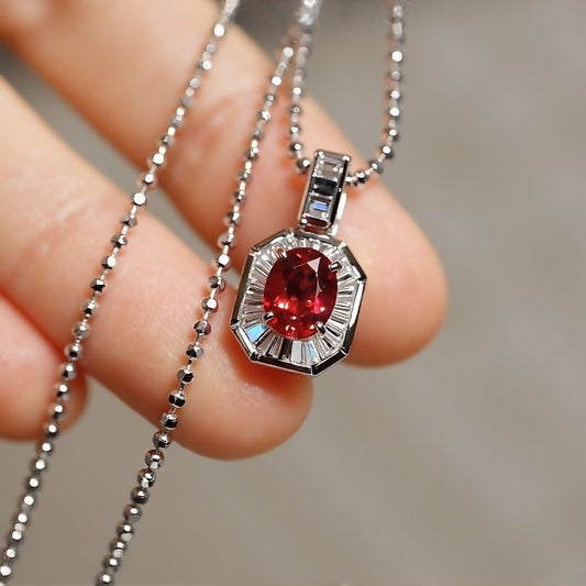 Lab-created ruby pendant with baguette diamond halo

