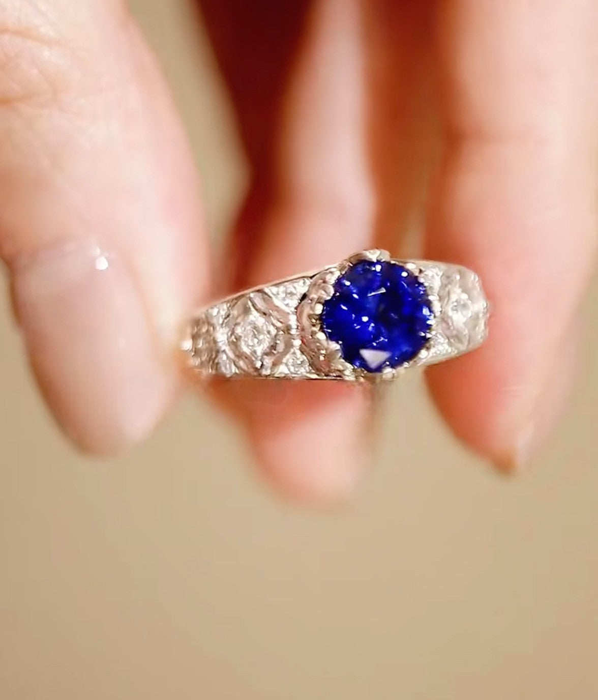 Tiranelle ring featuring 1ct lab sapphire with vintage diamond accents on silver band