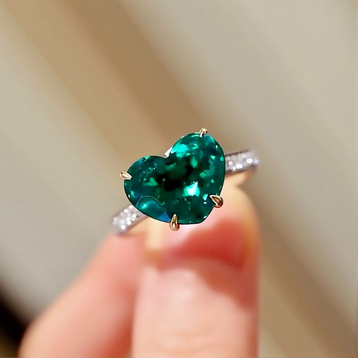 Emara heart-shaped lab emerald ring with pavé diamond band








