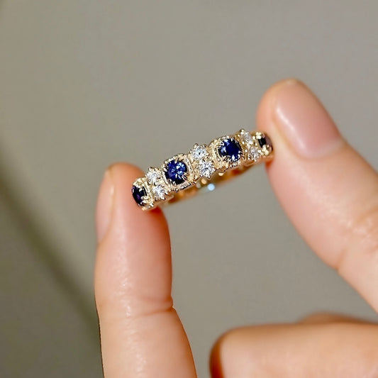 Half eternity band with blue sapphires and lab diamonds in solid gold








