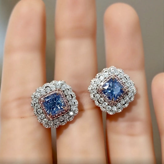 Celestara earrings with lab-grown blue diamonds and scalloped double halos
