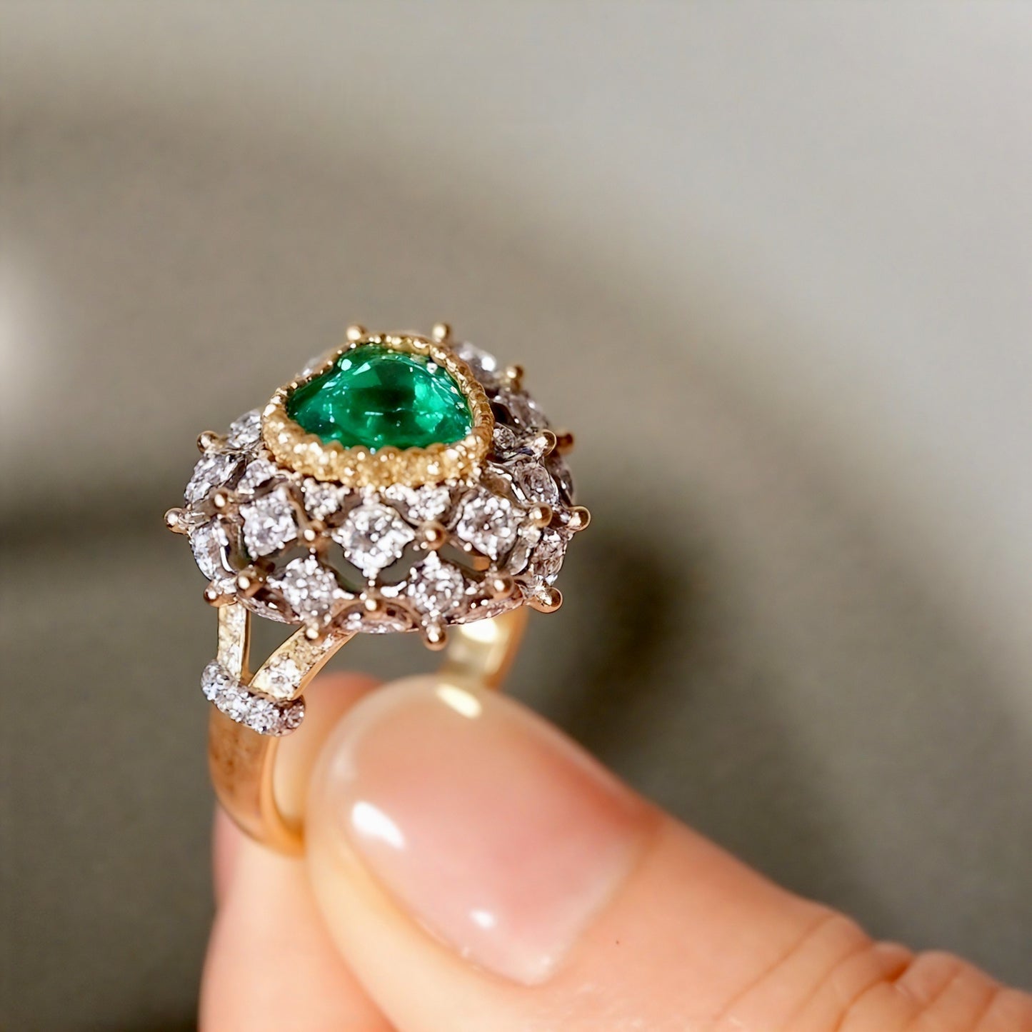 Heart-cut emerald dome ring with lab diamonds
