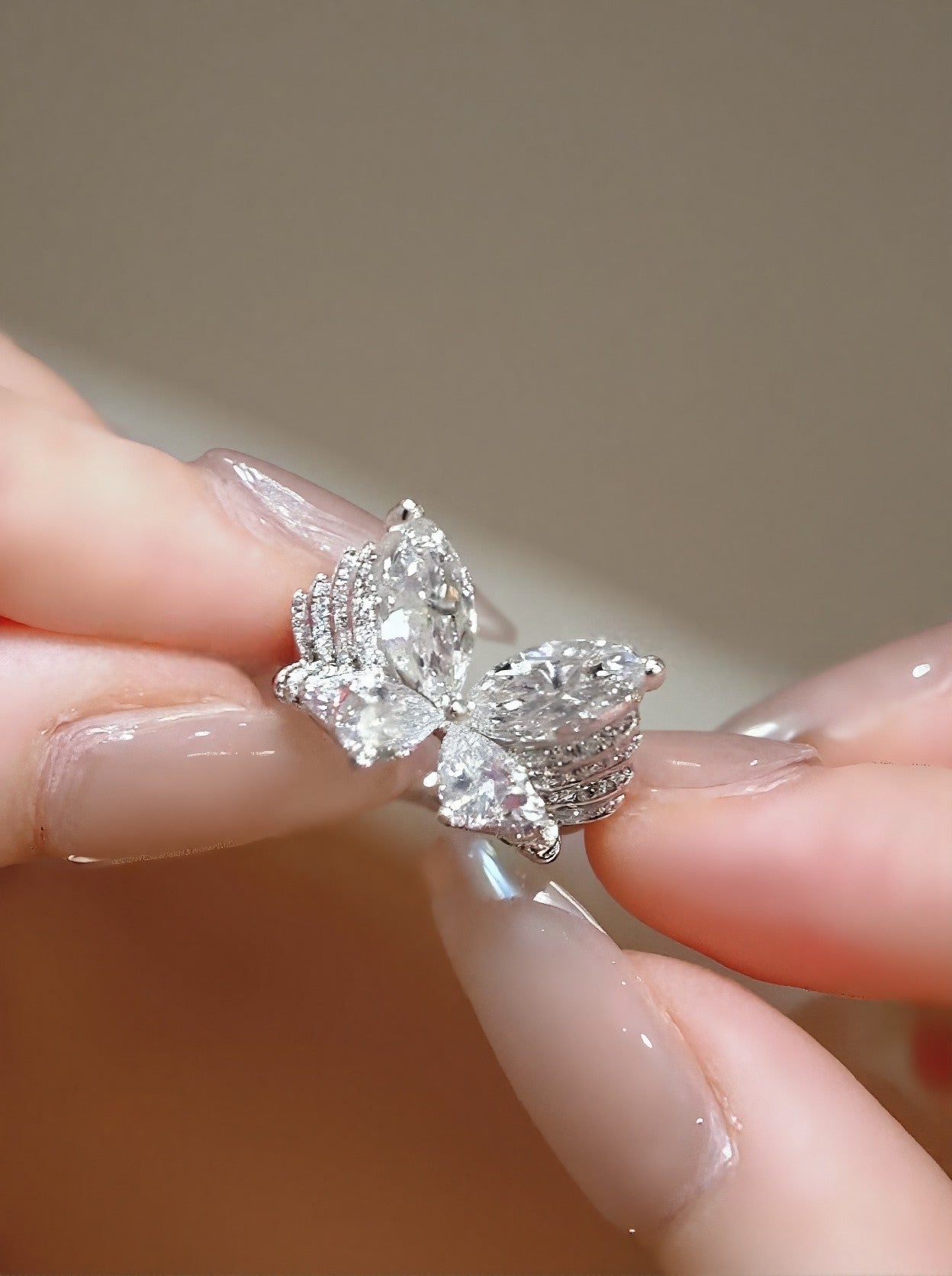 Brynja butterfly ring with lab-grown marquise and pear diamonds in white gold – delicate and symbolic fine jewelry design

