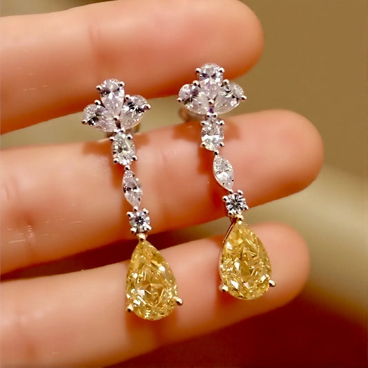 Sorelia drop earrings with 1.5ct lab-grown yellow diamonds and white lab diamonds in a cascading design
