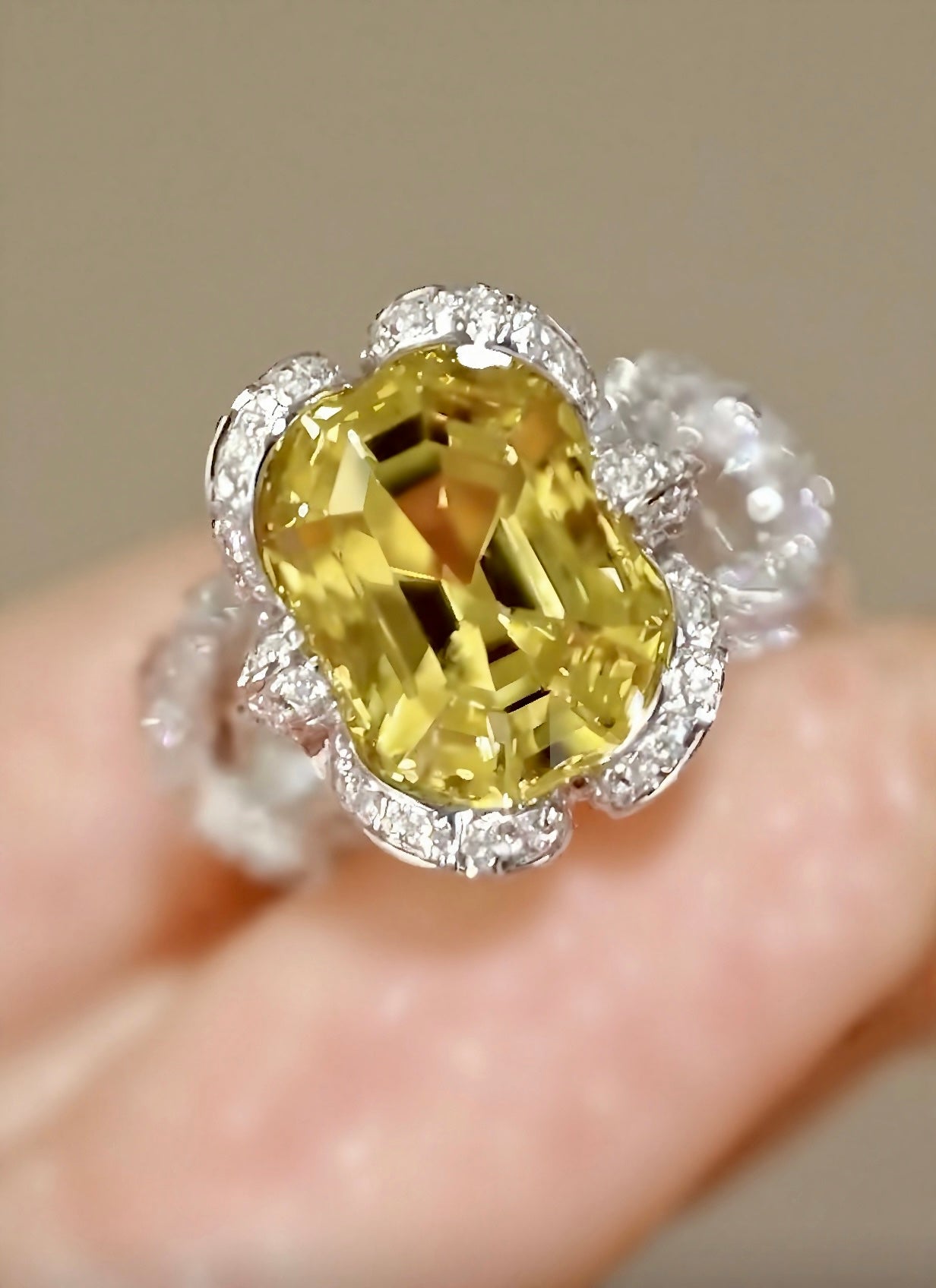 Zeryna ring with 6ct lab canary yellow sapphire and diamond halo in vintage-inspired white gold setting








