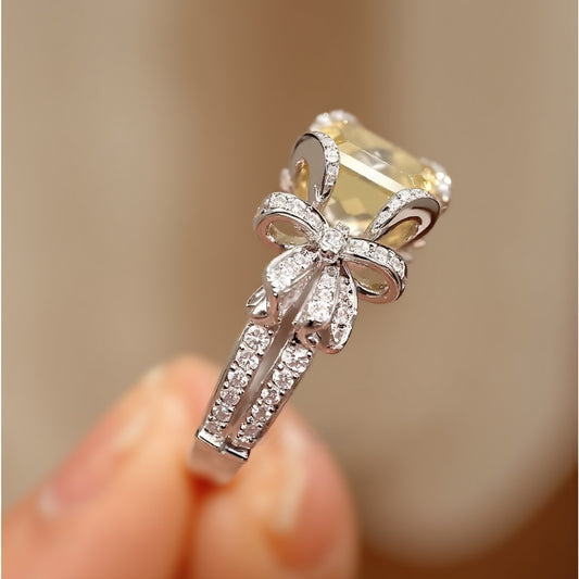 3ct radiant lab diamond ring with bow setting and pavé accents








