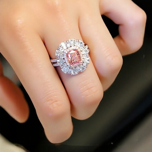 Adara cushion-cut pink diamond halo ring with white lab diamonds and double pavé bands in white gold








