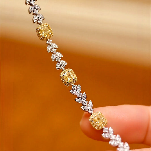 Floral-inspired bracelet with lab-grown yellow diamonds and marquise diamond leaves
