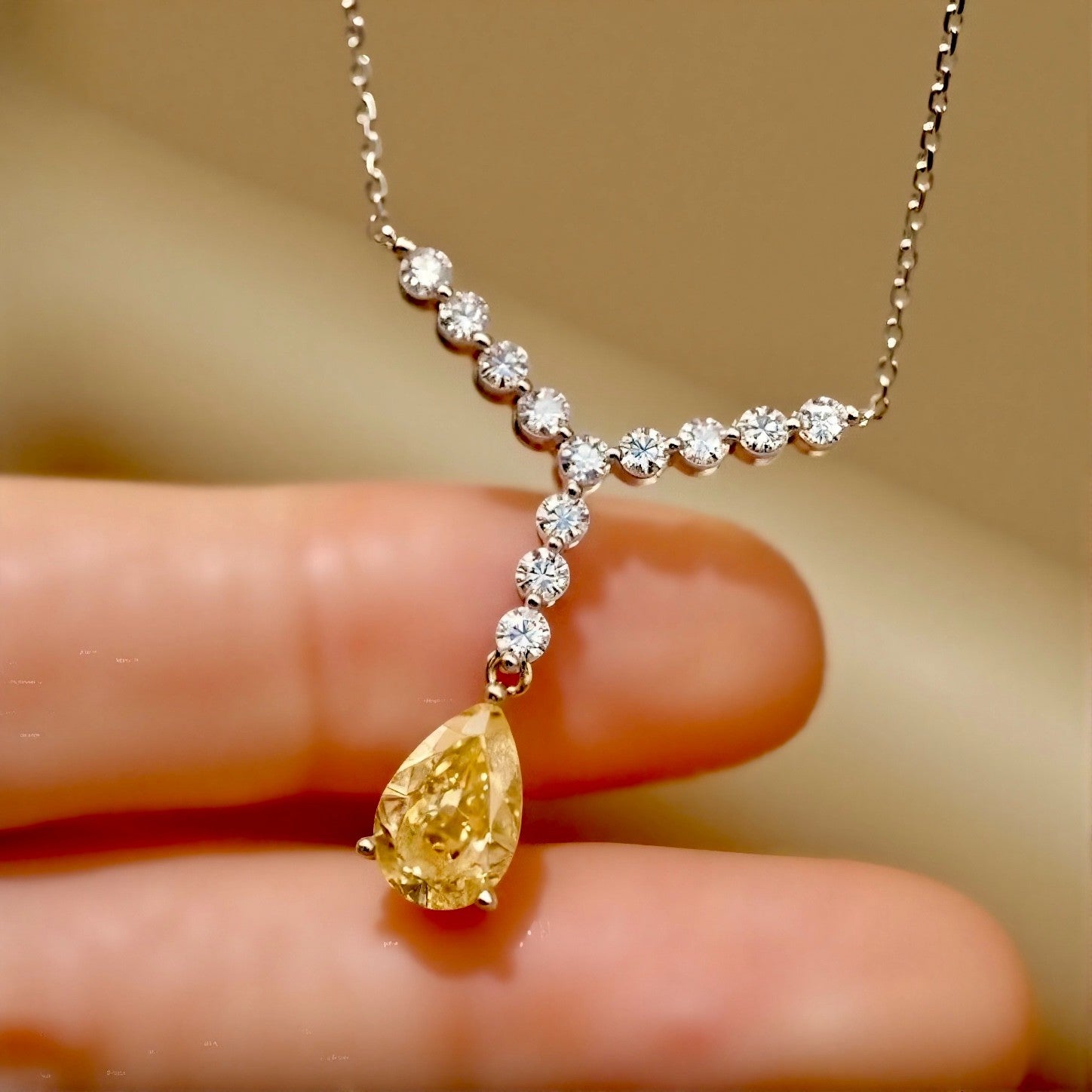 2ct pear-shaped yellow lab diamond drop necklace with white diamond chain in Y setting
