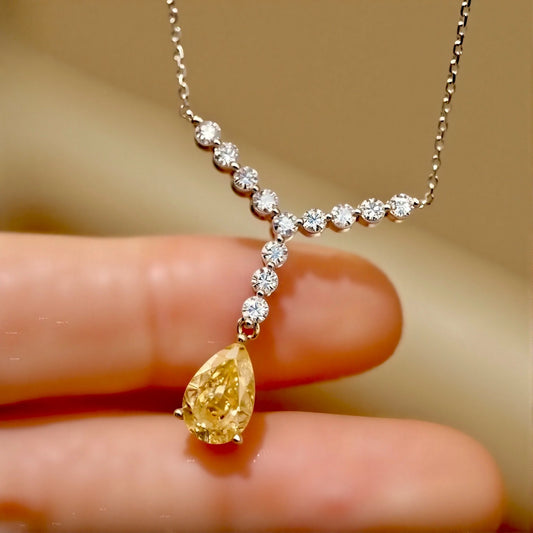 2ct pear-shaped yellow lab diamond drop necklace with white diamond chain in Y setting
