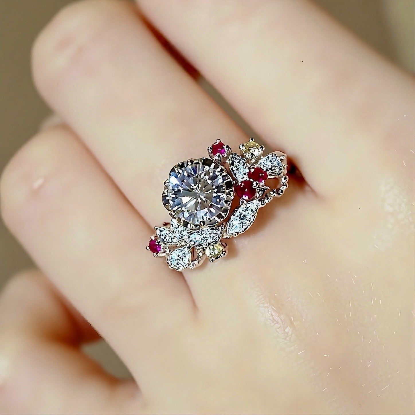 Elantria ring with round lab-grown diamond center, ruby, yellow, and white gemstone floral accents in gold – asymmetrical designer engagement ring

