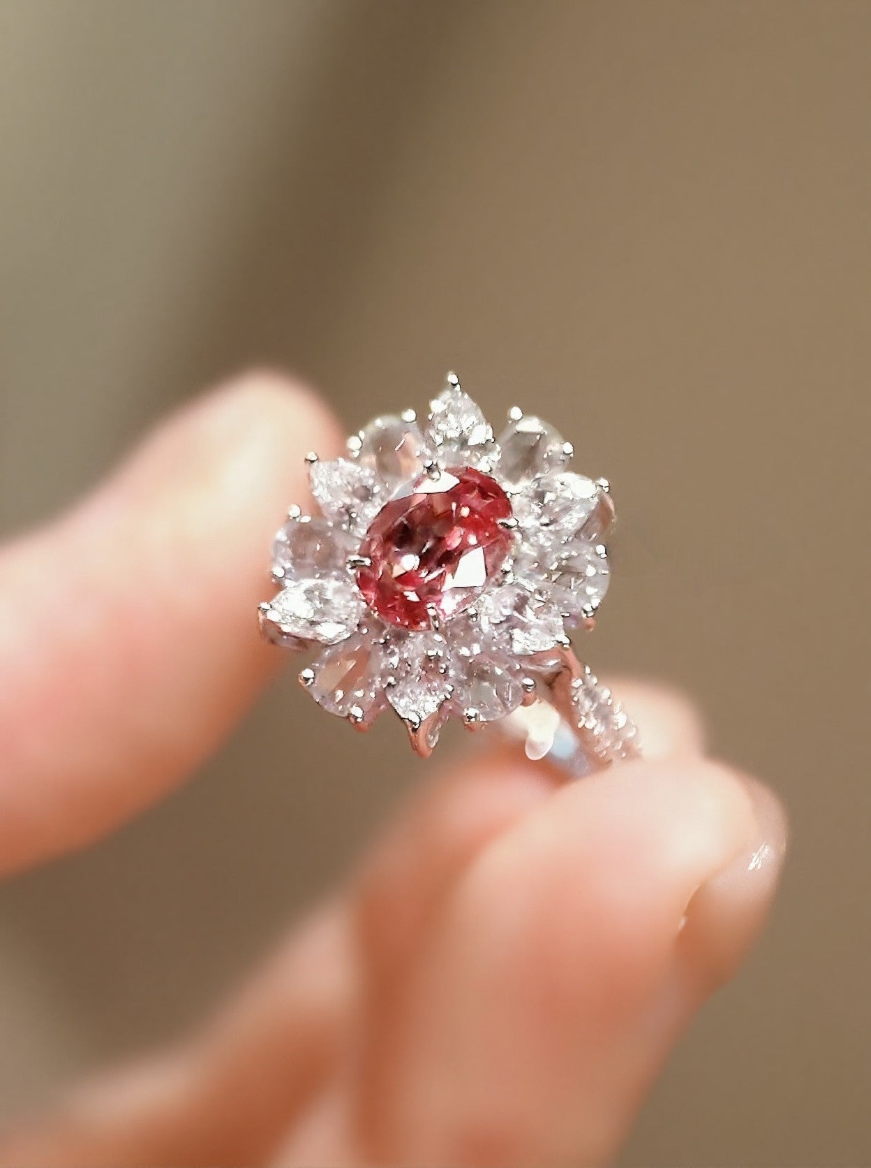 Dravena ring with 1ct lab-grown padparadscha sapphire and diamond petal halo in floral white gold setting – romantic fine jewelry design

