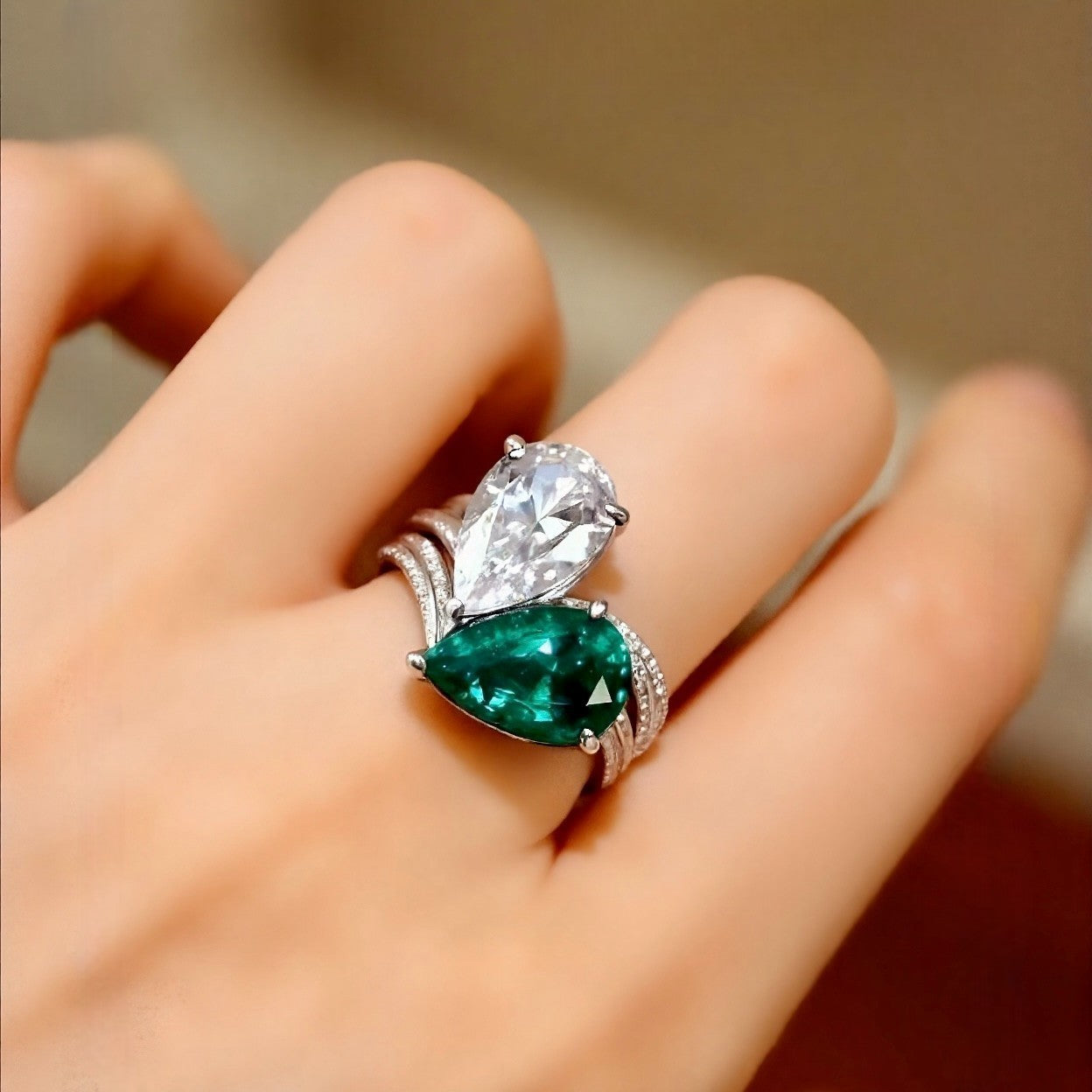 Matching lab-grown emerald and diamond two-ring set in white gold









