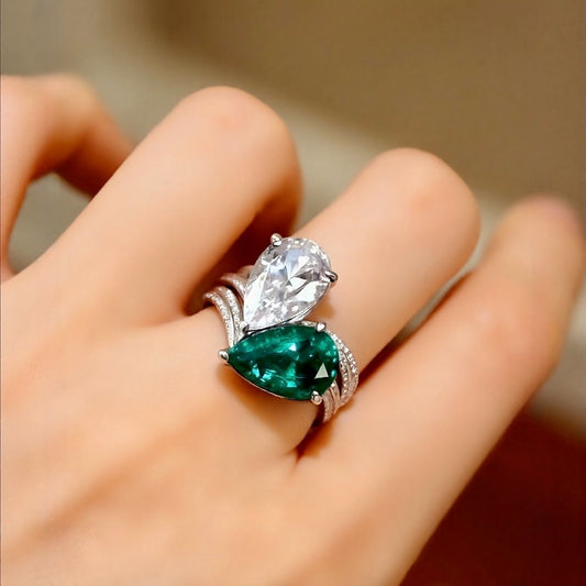 Matching lab-grown emerald and diamond two-ring set in white gold








