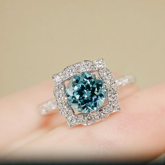 Blue lab diamond ring with floral diamond halo

