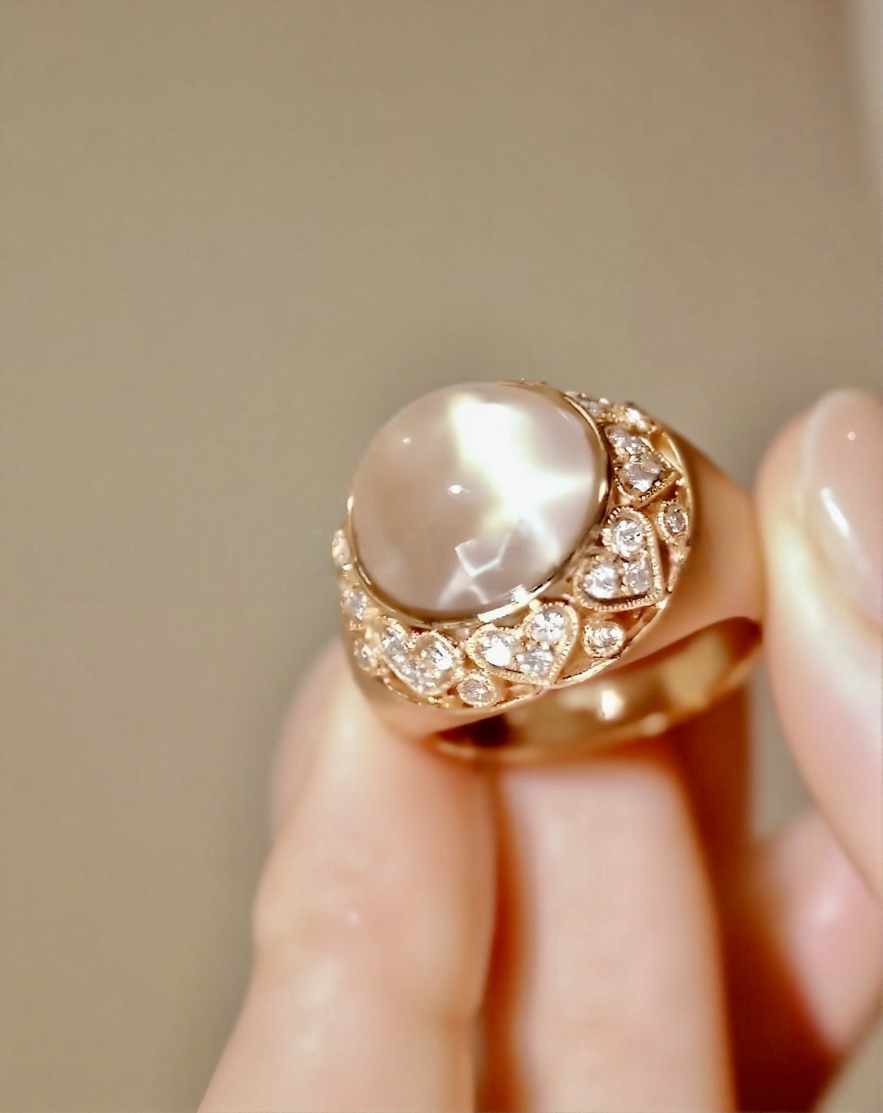 Lysira ring with natural rose quartz and diamond halo in rose gold








