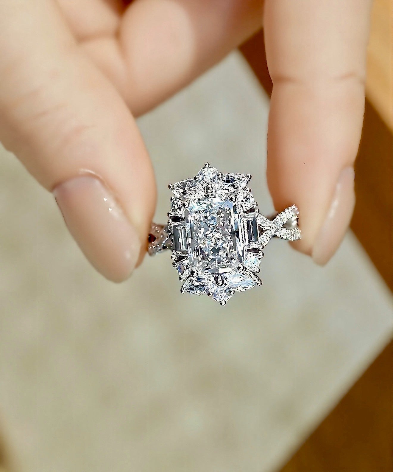 Zephyra radiant cut lab diamond halo engagement ring with twisted diamond band








