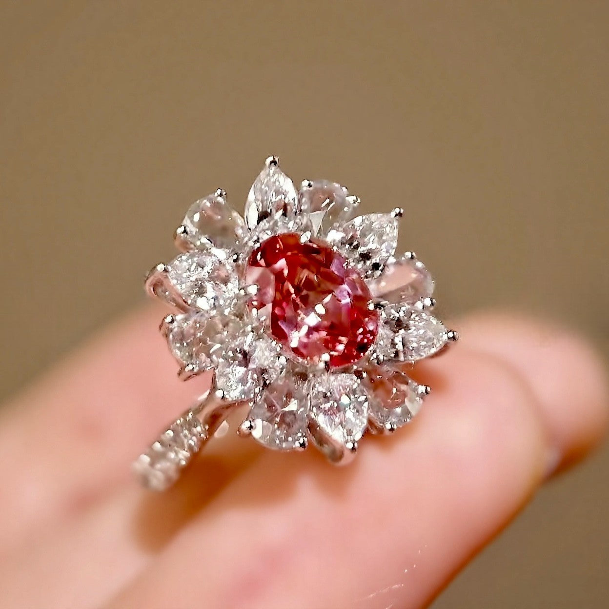 Dravena ring with 1ct lab-grown padparadscha sapphire and diamond petal halo in floral white gold setting – romantic fine jewelry design
