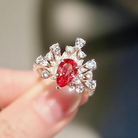 Solara Ring with 6x8mm Padparadscha sapphire and petal halo
