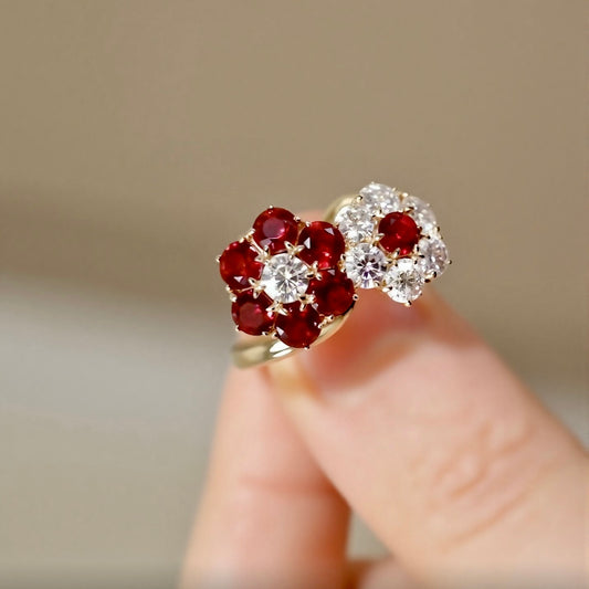 Open floral ring with lab-grown rubies and diamonds in solid gold setting








