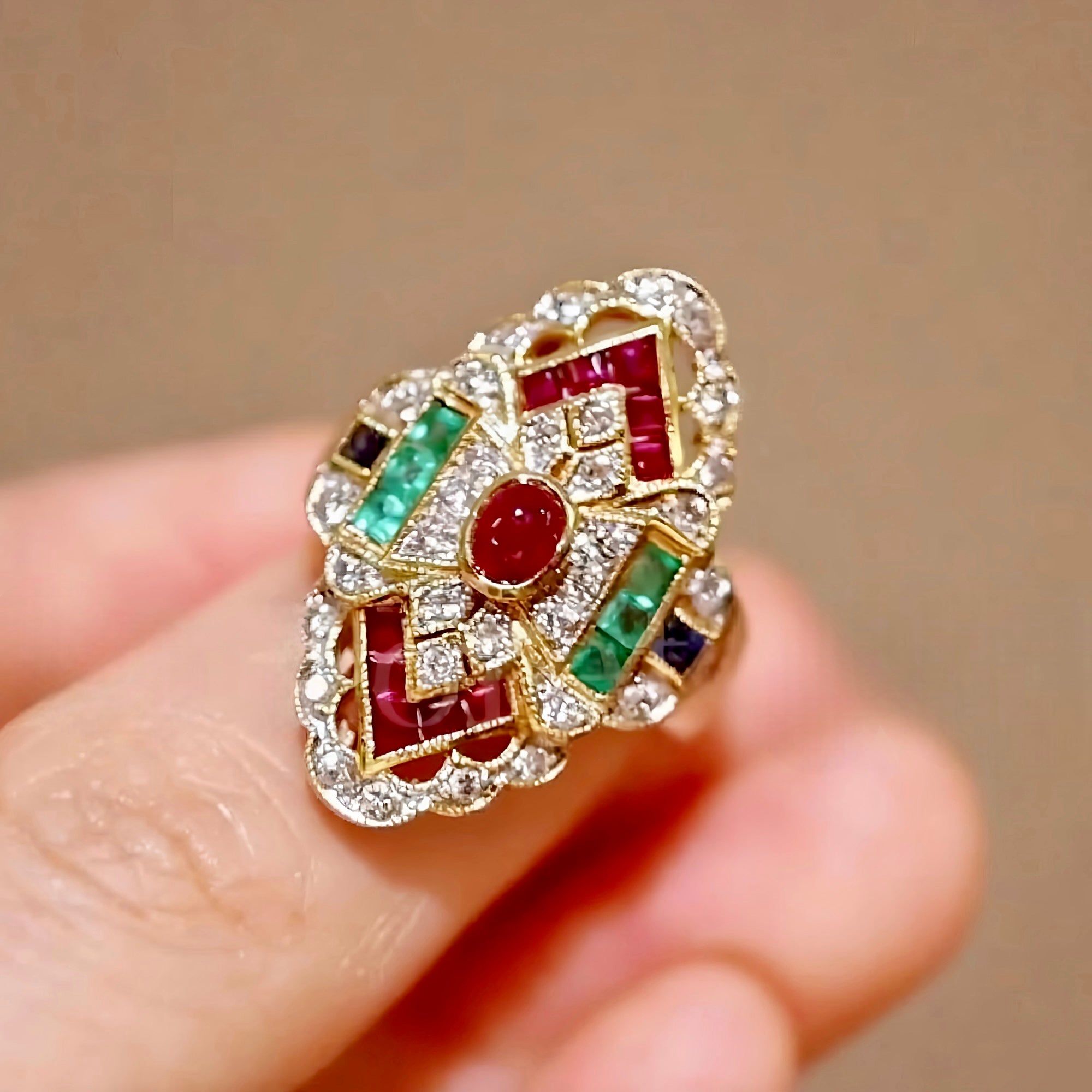 Melantha lab ruby and emerald ring with sapphire and diamond accents in vintage gold setting