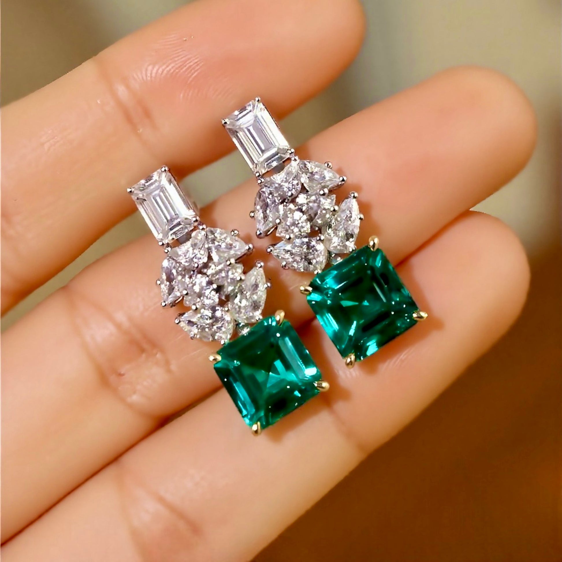 Naelis drop earrings with 2.5ct lab emeralds and lab diamond clusters in white gold








