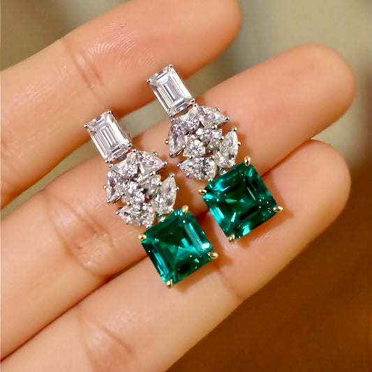 Naelis drop earrings with 2.5ct lab emeralds and lab diamond clusters in white gold








